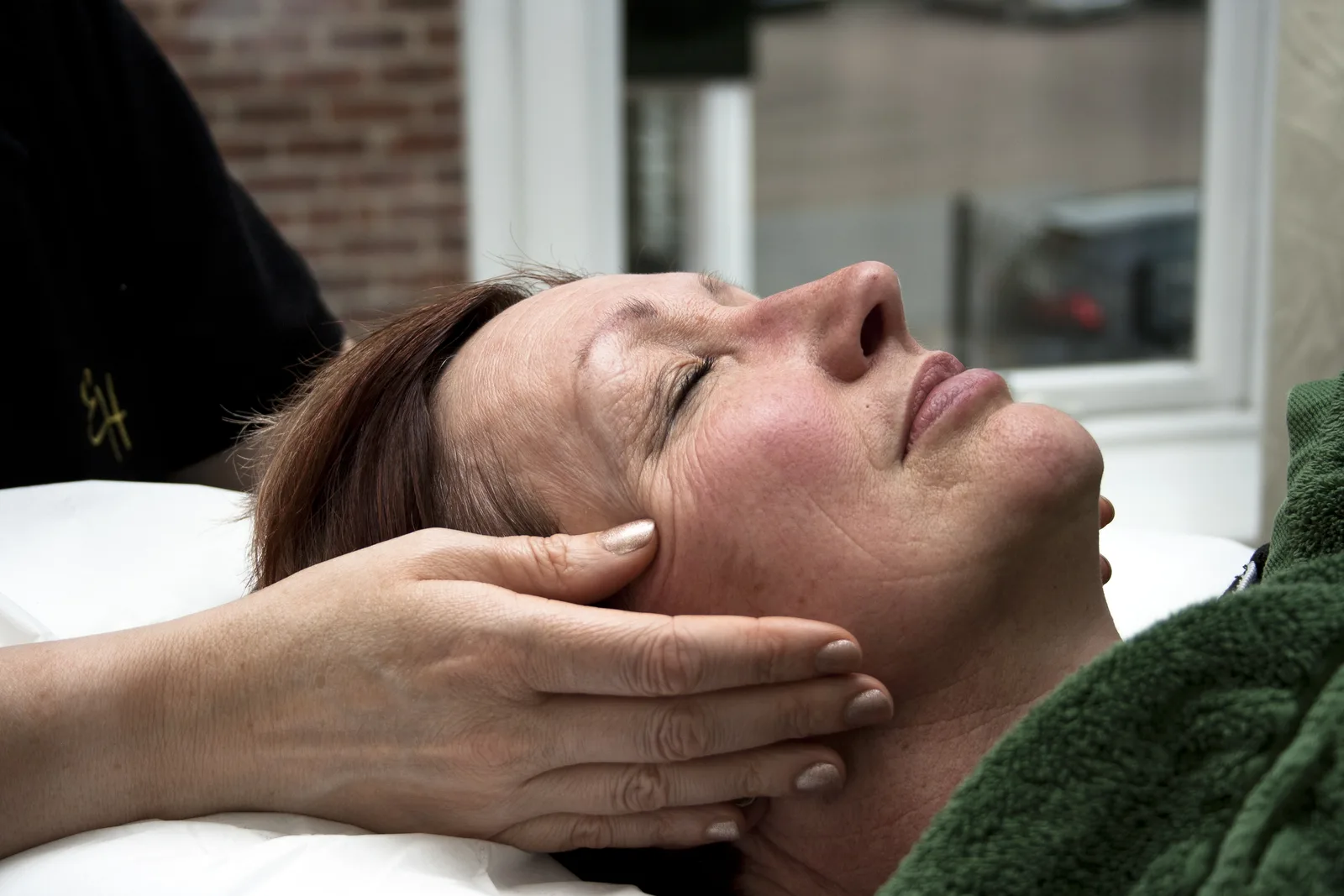 Relaxing hot stone massage at Elite Health Knutsford